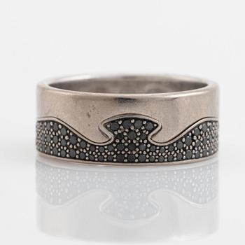 Georg Jensen, "Fusion" white gold and black diamond two rings.