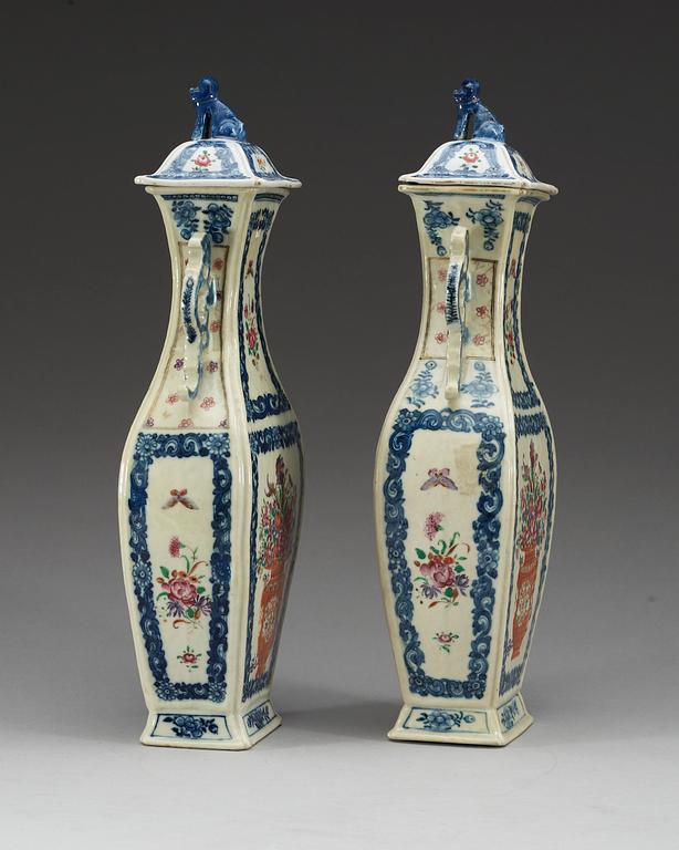 A pair of famille rose vases with covers, Qing dynasty, Qianlong (1736-95).