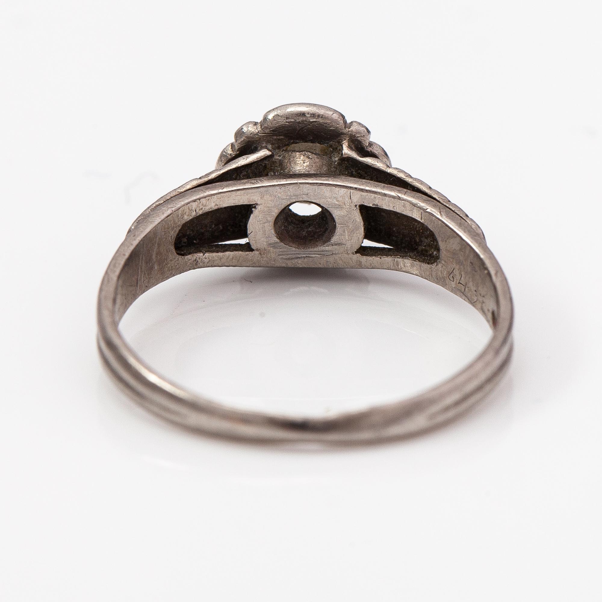 A Tillander, a palladium ring with a ca. 0.23 ct diamond. Helsinki.