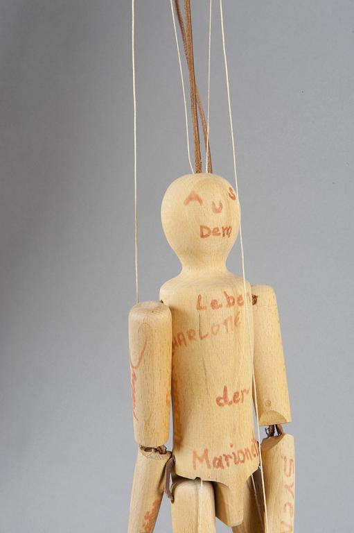 A WOODEN PUPPET,