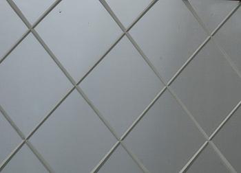 A mahogany mirror from Glas&Trä, Hovmantorp.