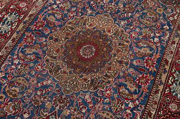 An Isfahan, semi-antique rug, c. 205 x 135 cm.