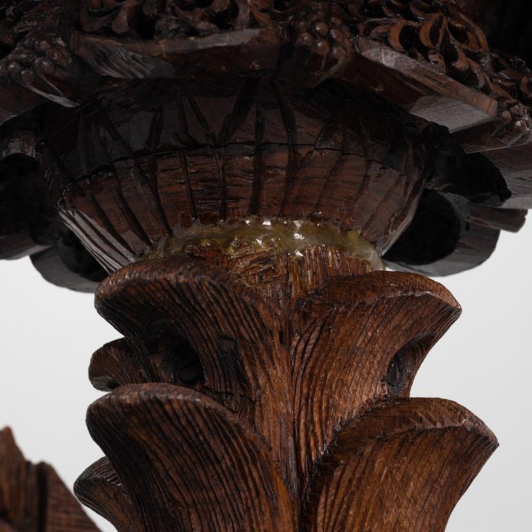 A South East Asian carved wooden piedestal,  20th Century.