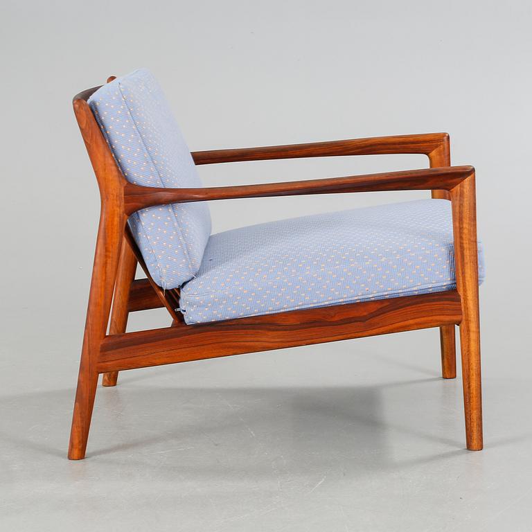 A mid 20th century "USA 75" chair, designed by Folke Ohlsson for Dux Möbel AB 1963.