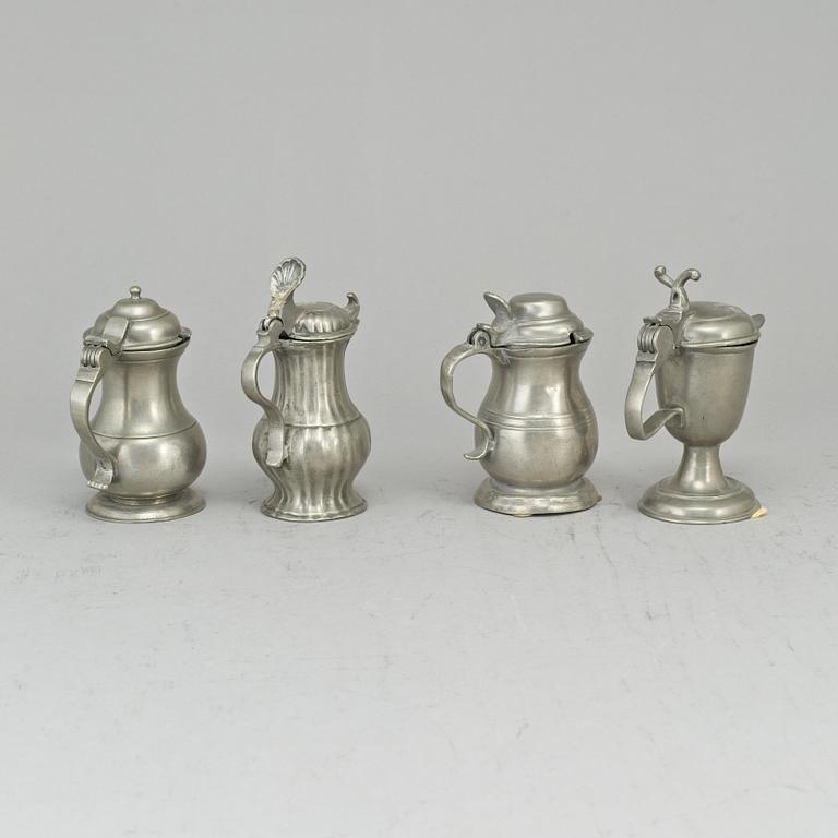 Eight pewter mustard pots, 18th/19th century.
