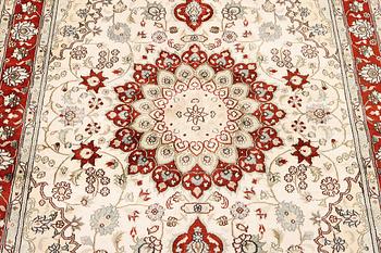 A carpet, Turkey, silk, c. 180 x 120 cm.