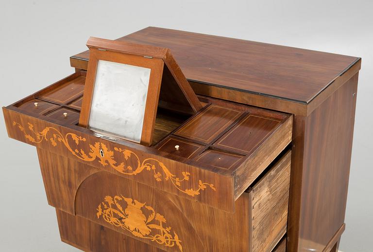 An empire chest of drawers, 19th century.