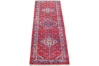 A Hamadan carpet, c. 304 x 84 cm.