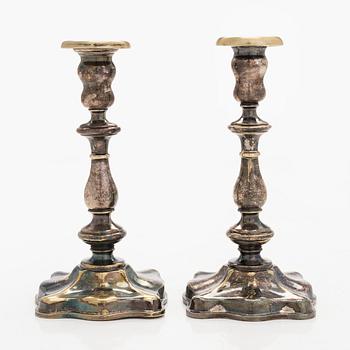 A pair of Fraget silver-plated candelsticks, Warsaw 1851-59.