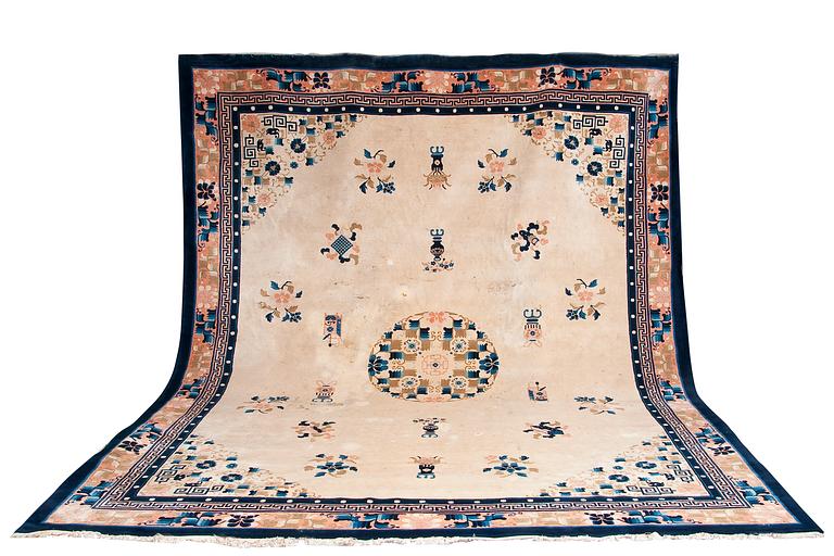 AN SEMI-ANTIQUE CHINESE CARPET.