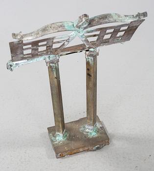 a three piece metal sculpture, signed.