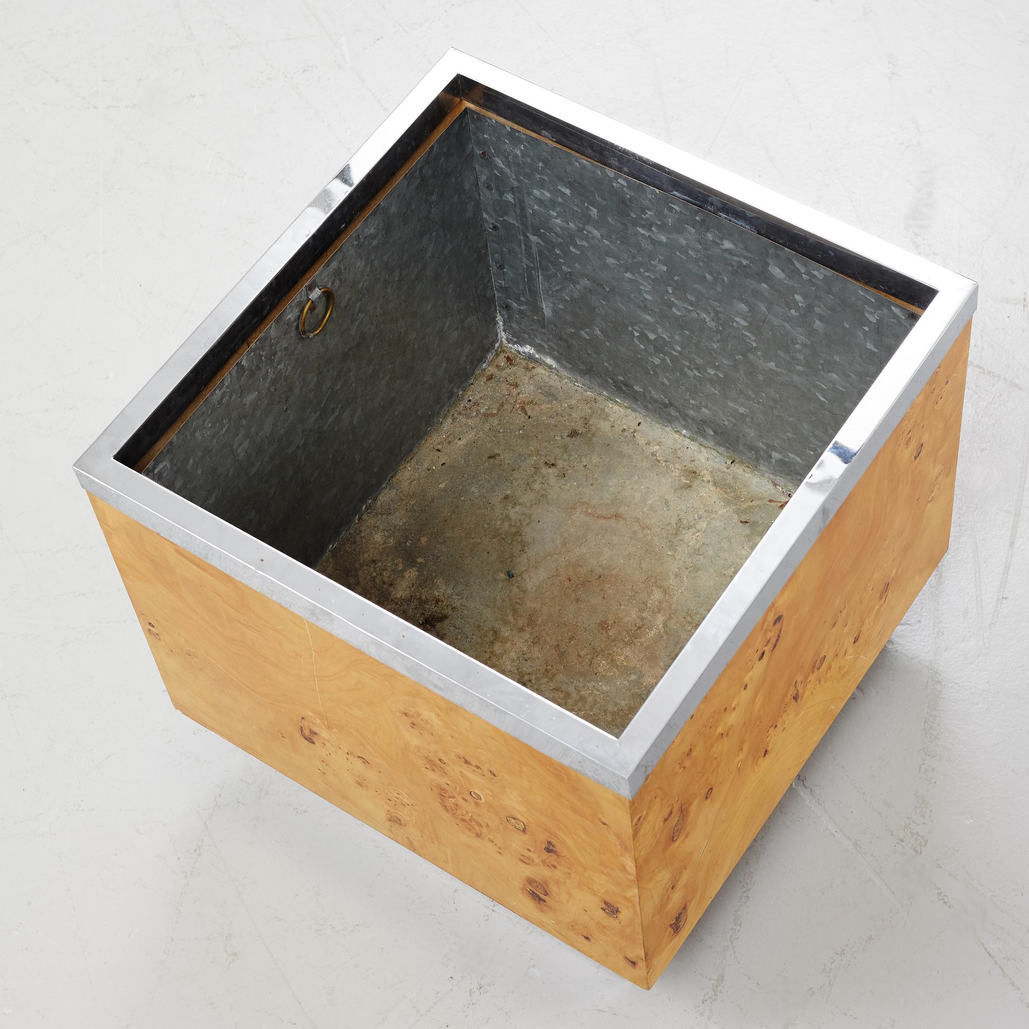 A birch and metal flowerpot, Vaia del Sud, Italy, second half of the 20th century.