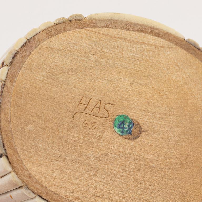 A birch box covered with engraved reindeer horn.