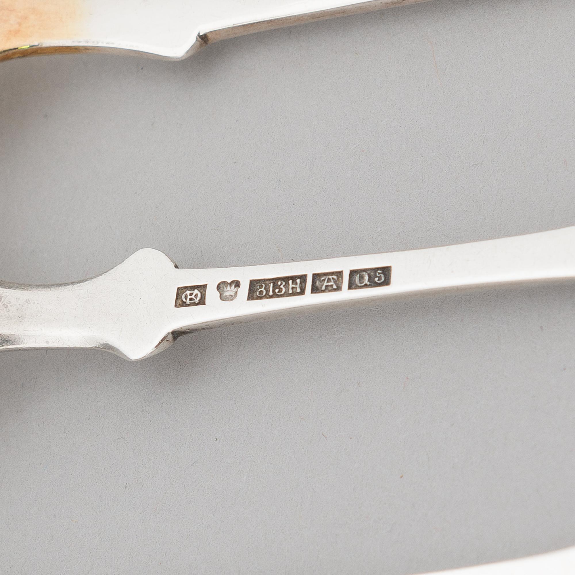 A 42-piece set of silver cutlery with seashell decorated handles, Finnish hallmarks, 1918-1950.