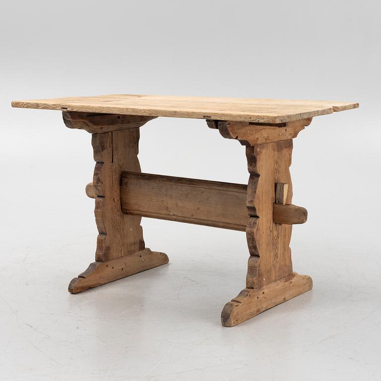A pine trestle table, 19th century.