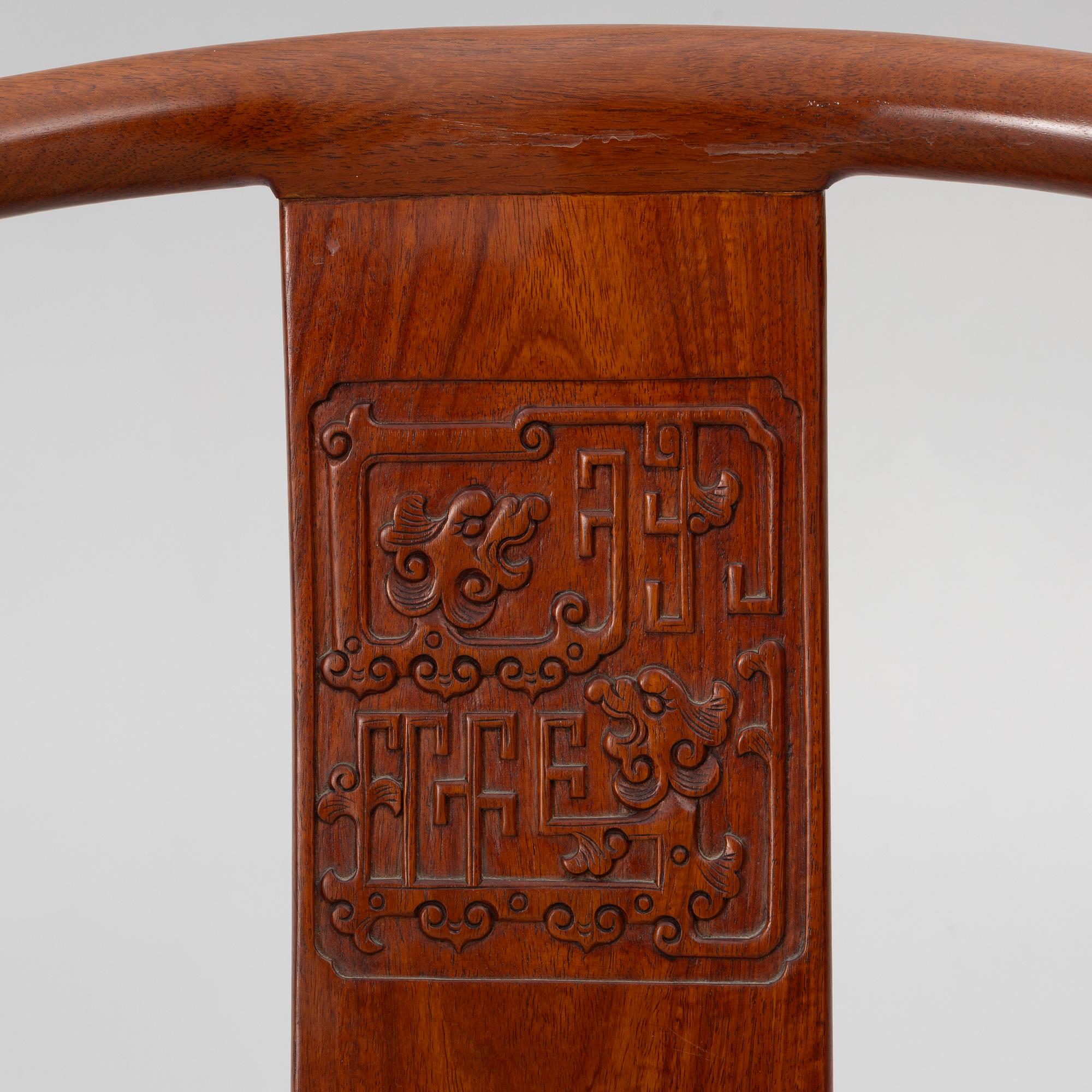 A pair of hardwood 'horse shoe back' hardwood armchairs, Hong Kong, 1960s.