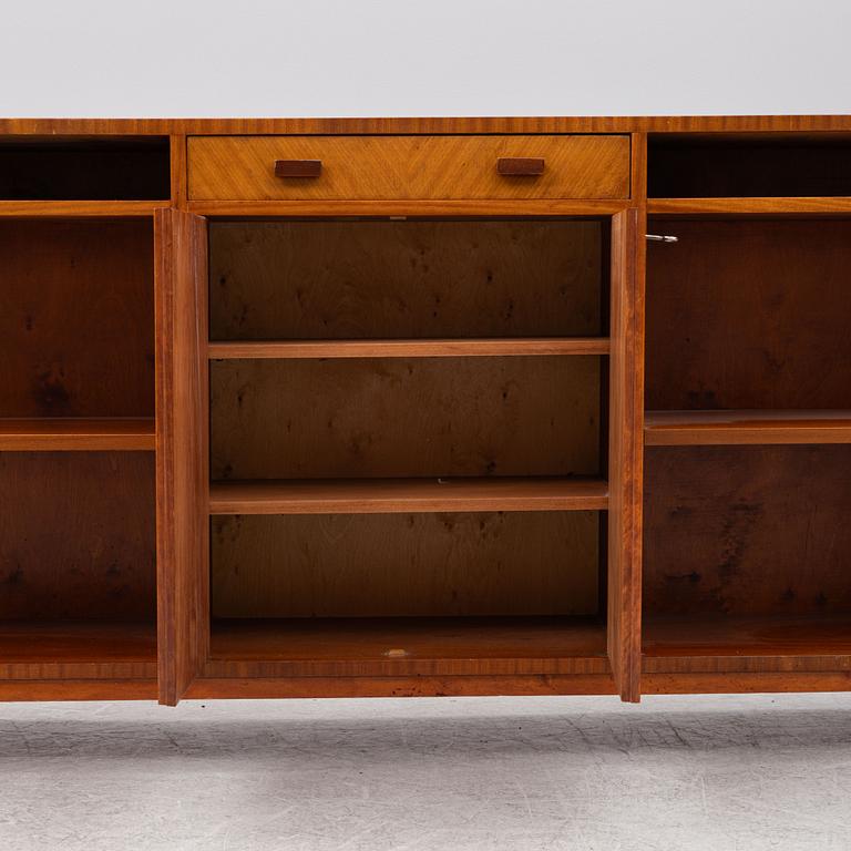 A ahogany-veneered 1940's/50's bookcase.