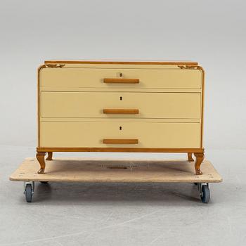 An elm veneeded chest of drawers, 1940's.