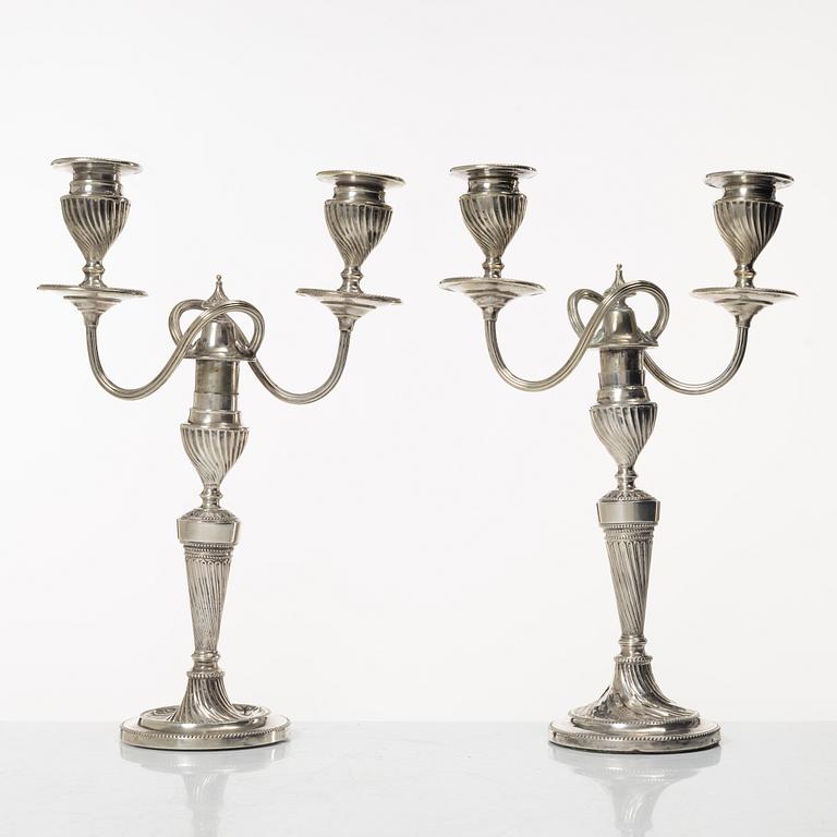 A pair of English silver candelabra, mark of Hawksworth, Eyre & Co Ltd, Sheffield 1892.
