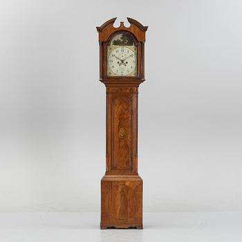 A mahognay long case clock from around the year 1800, H Bunyan Lincoln.