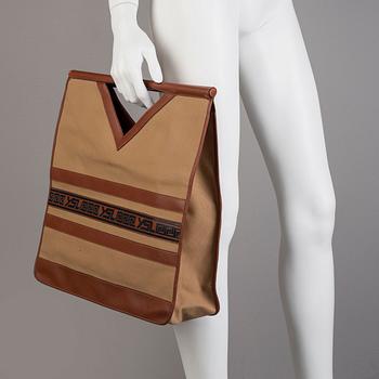 Tote and clutch by Yves Saint Laurent, 1970's.