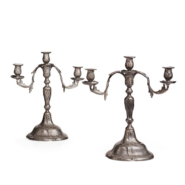 A pair of Swedish Rococo pewter three-light candelabra by Anders Wetterquist, Stockholm 1774.