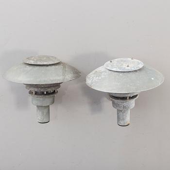 A pair of late 20th century outdoor lights.