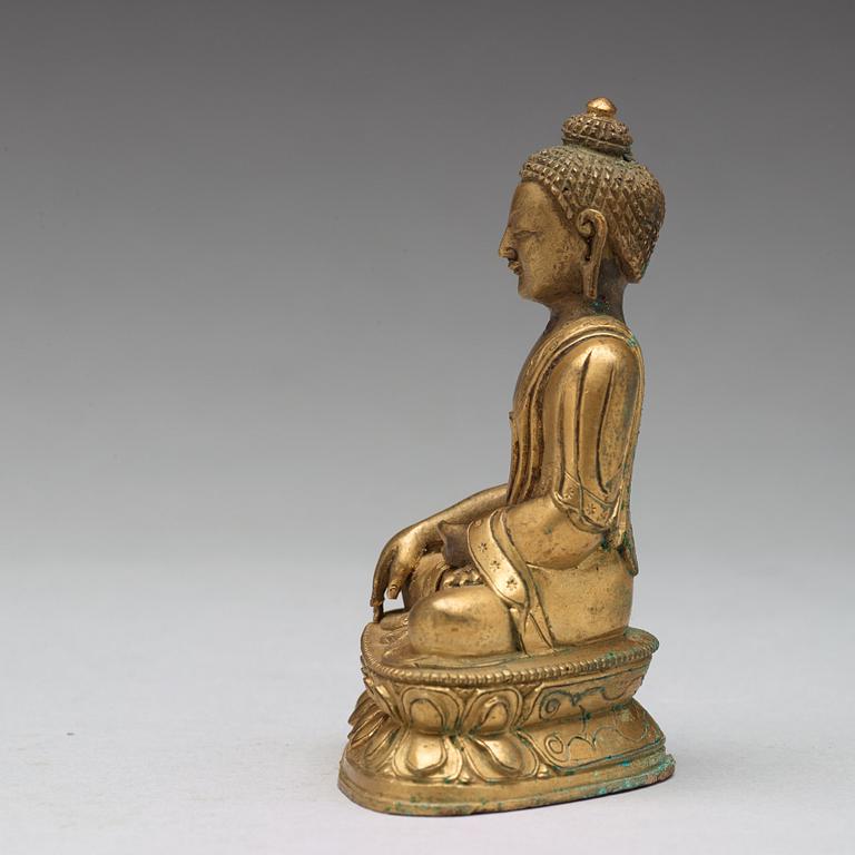 Two copper alloy figures of buddha, Sino-Tibetan, circa 1900.