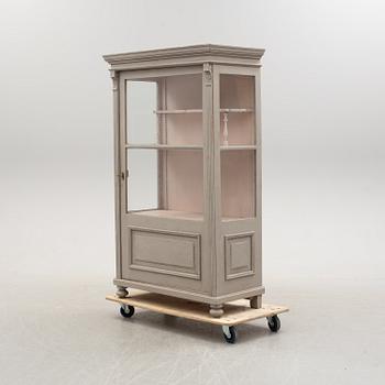 A late 19th century painted display cabinet.