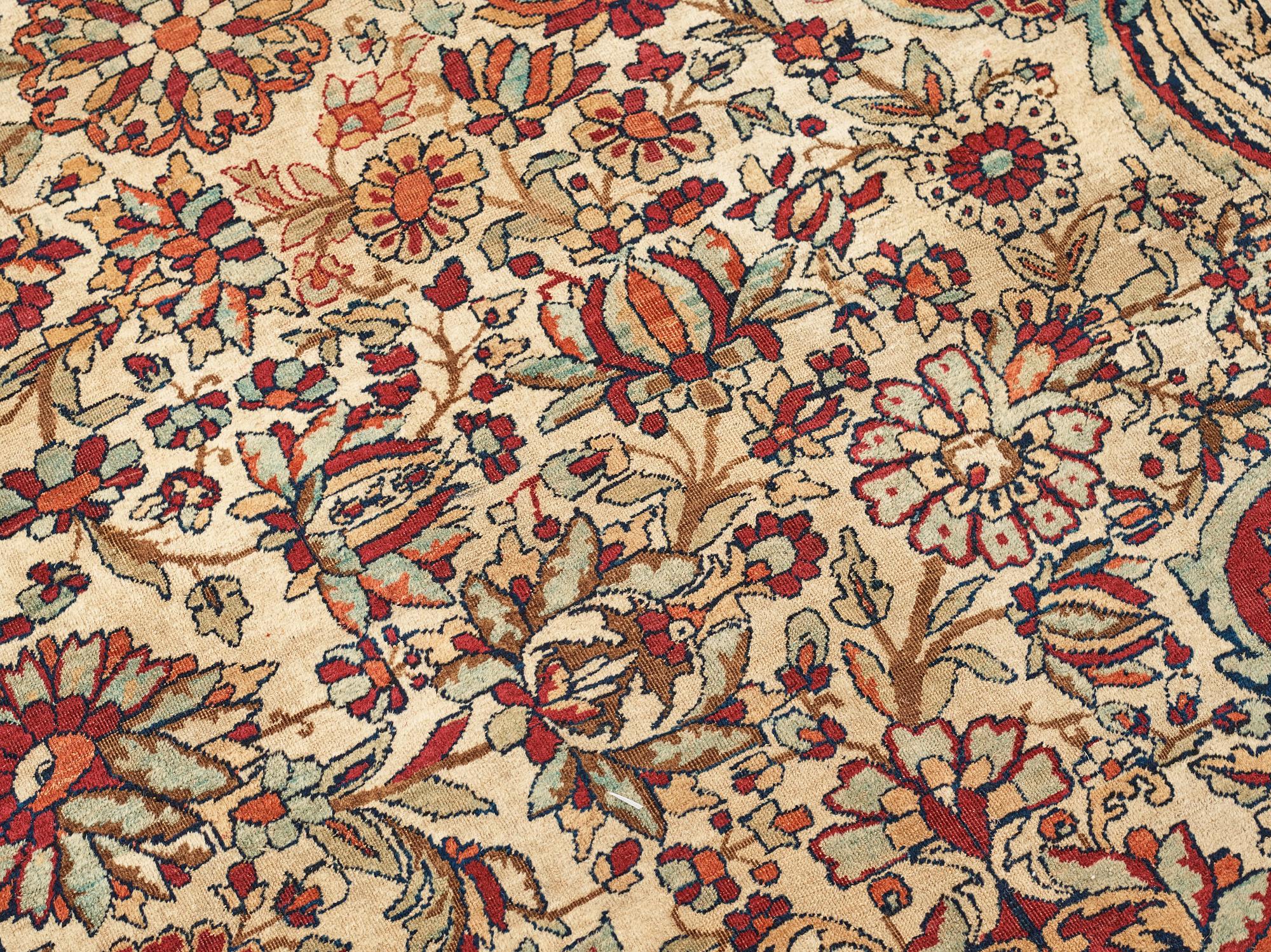 A carpet, an antique Kerman Laver, ca 677-688,5 x 510,5-526 cm.