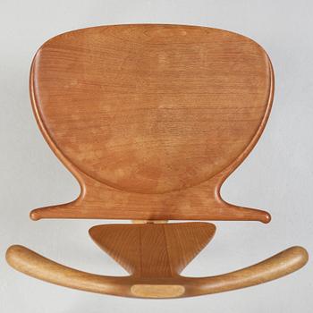 A Hans J Wegner 'Jakkens Hvile' teak chair, Johannes Hansen, Denmark.