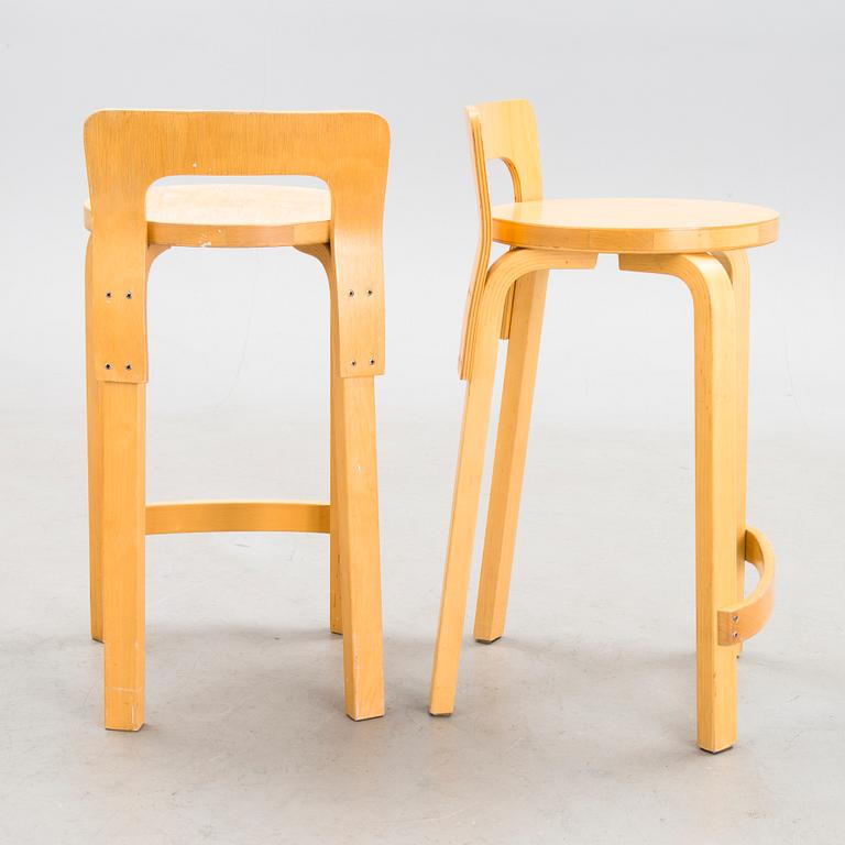 Two K65 bar stools, Artek, end of the 20th Century. Model designed in 1935.