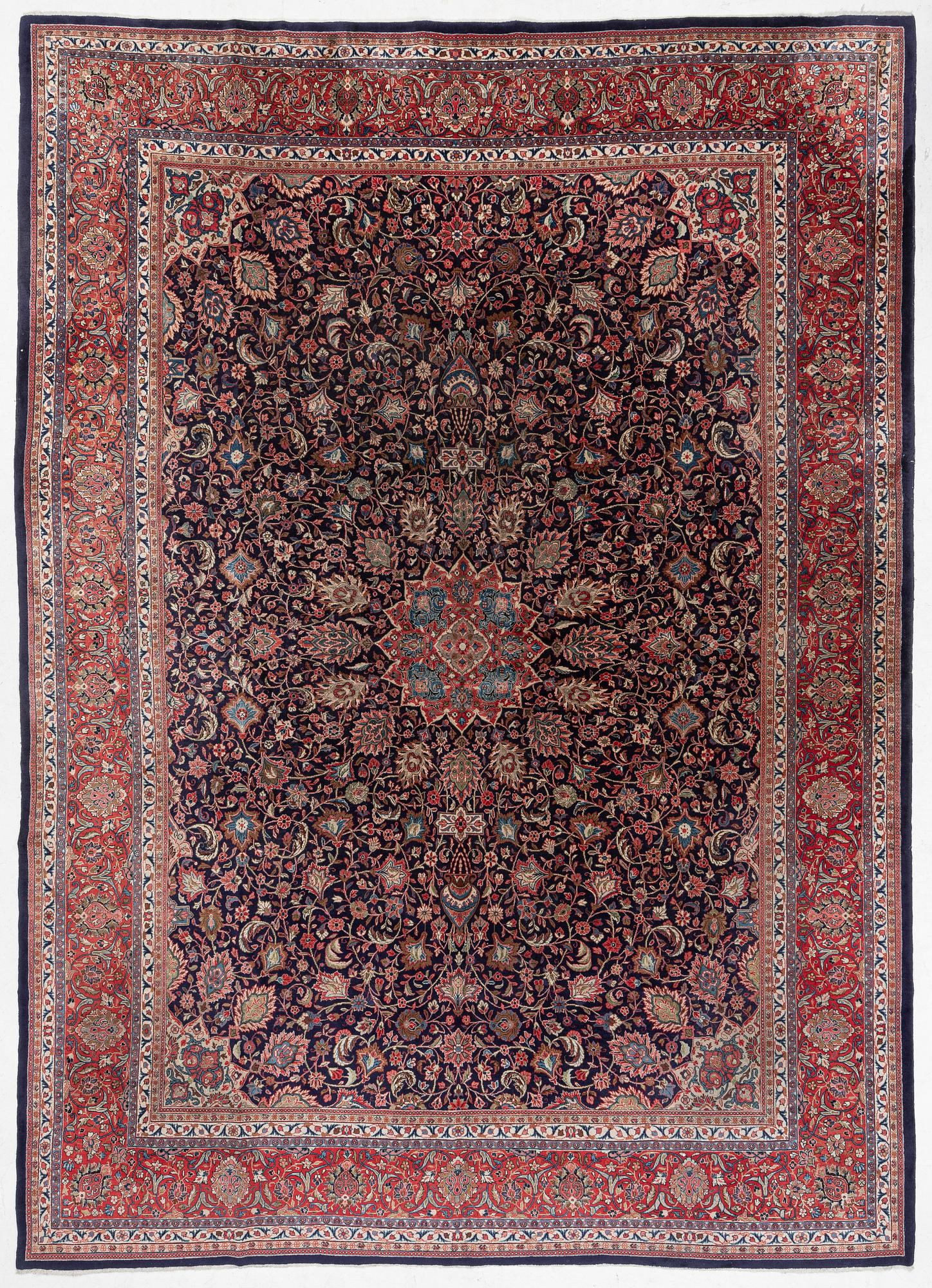 A Persian carpet, c. 445 x 320 cm.