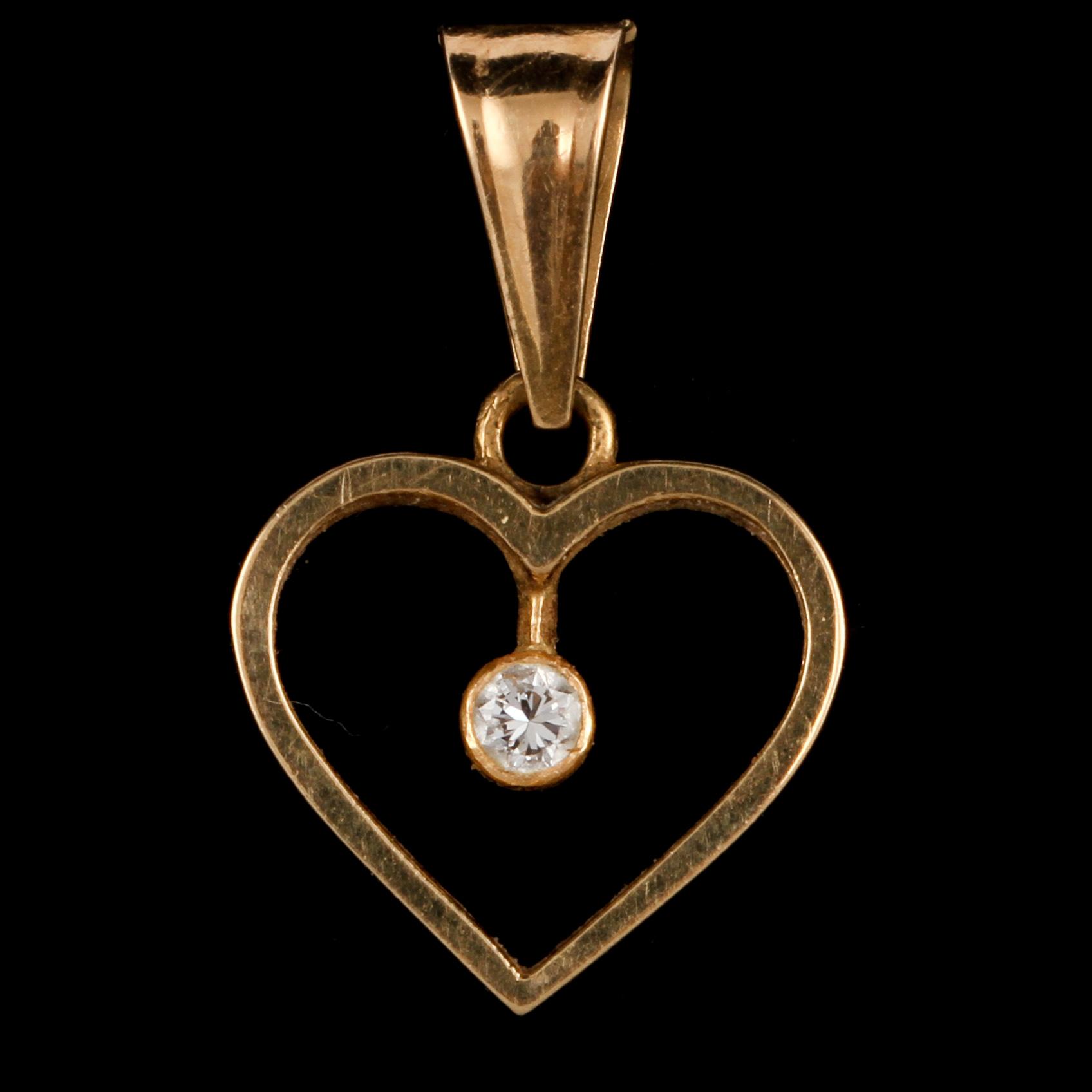 HÄNGE, 18k guld med briljantslipad diamant, Ceson, Göteborg, 1900-talets andra hälft. Vikt 2 g.