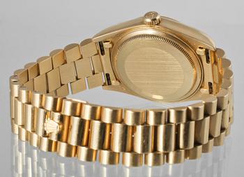 ARMBANDSUR, herr, 18 k guld, "Day-date", Rolex. Total vikt ca  140 g.