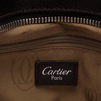 A bag "Marcello Reporter" by Cartier.
