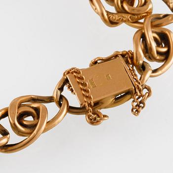 ARMLÄNK, 18K guld, importstämplad, 1939. Vikt 11,3 gram.