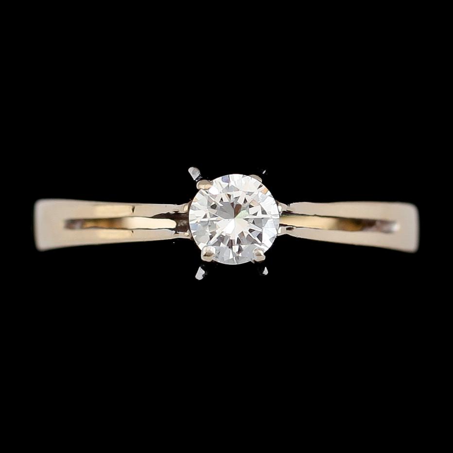 RING, 18K guld och vitguld, briljantslipad diamant 0.34 ct. Vikt ca 3 g.