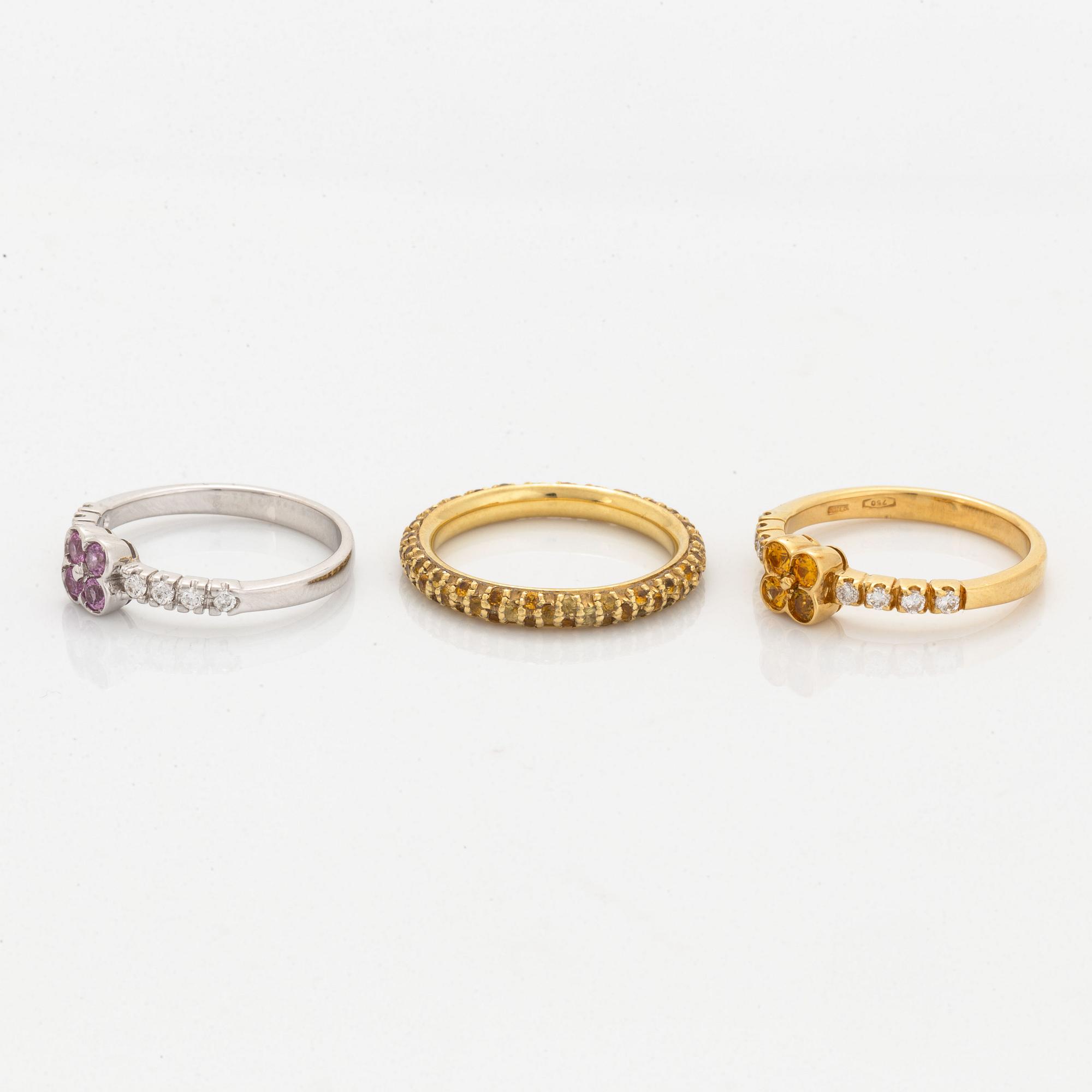 Yellow and pink sapphire and brilliant-cut diamond three rings.