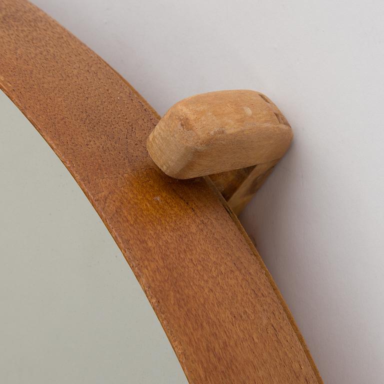 A mirror by Uno & Östen Kristiansson, Luxus, Vittsjö.