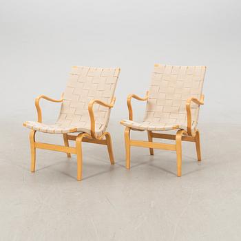 Bruno Mathsson, a pair of "Eva" armchairs for DUX, late 20th century.