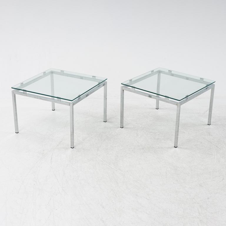 A pair of 1980's glass top side tables.