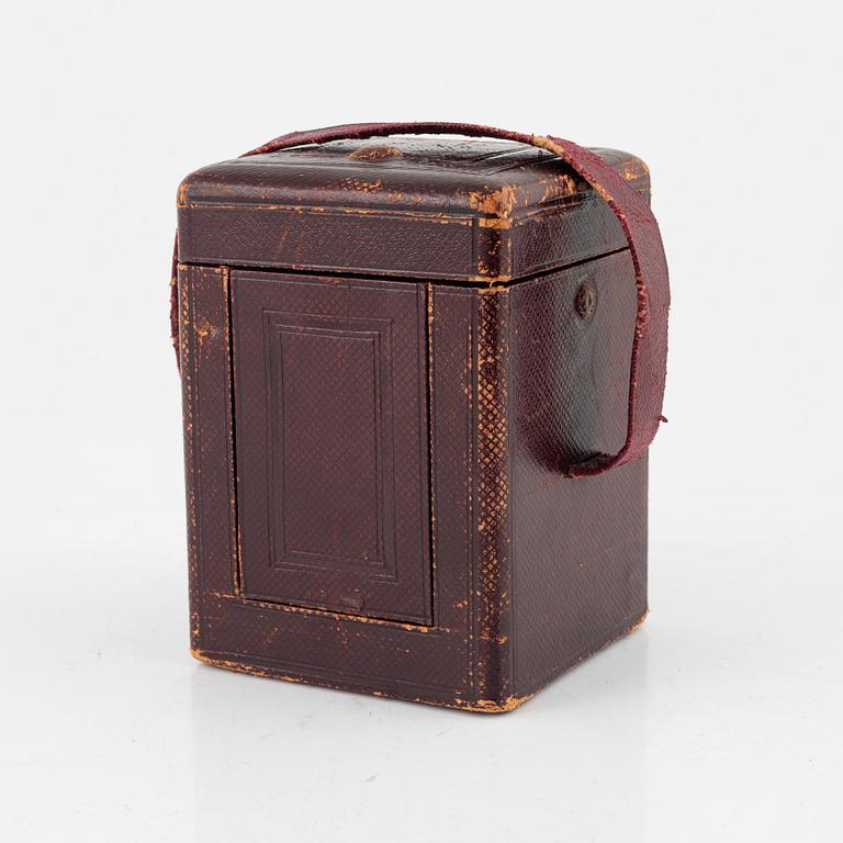 A French Brass and Glass Aiguilles Carriage Clock with Leather Case, first half of the 20th century.