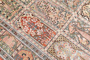 A silk Kashmir rug, c 247 x 161 cm.