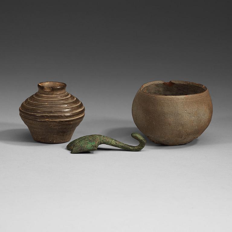 Two potted jars and a bronze belt hook, Han Dynasty (206 BC.-220 AD).