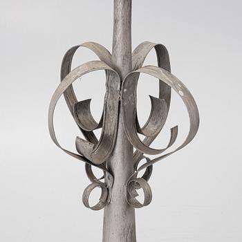 Tower spire with weather vane dated 1912.