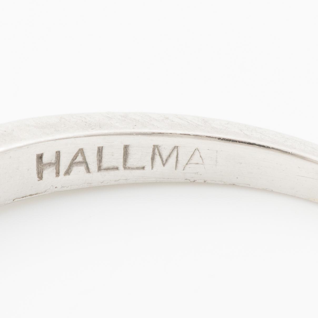 Platinum ring with baguette-cut diamonds.