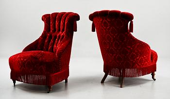 EMMAFÅTÖLJER, ett par, tapetserarstil, 1800-talets andra hälft.