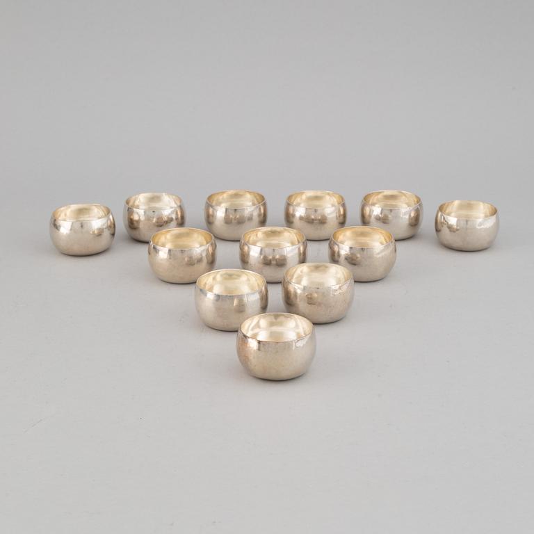 12 swedish sterling silver tumblers, mark of Eric Ericsson, Dalerik, Gävle 1964-65.