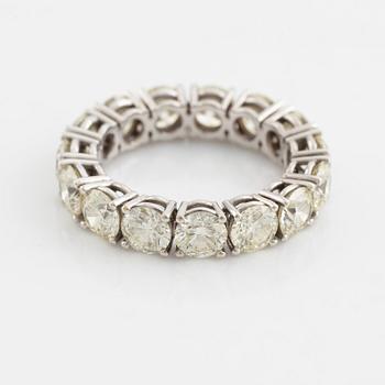 Brilliant cut diamond eternity ring.